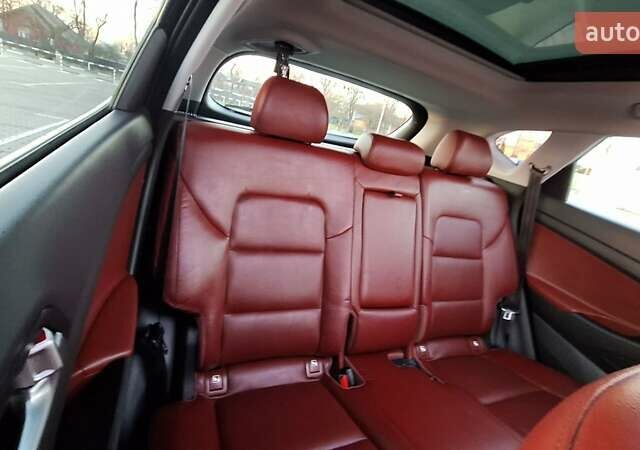 Чорний Хендай Туксон, об'ємом двигуна 2 л та пробігом 192 тис. км за 21000 $, фото 51 на Automoto.ua