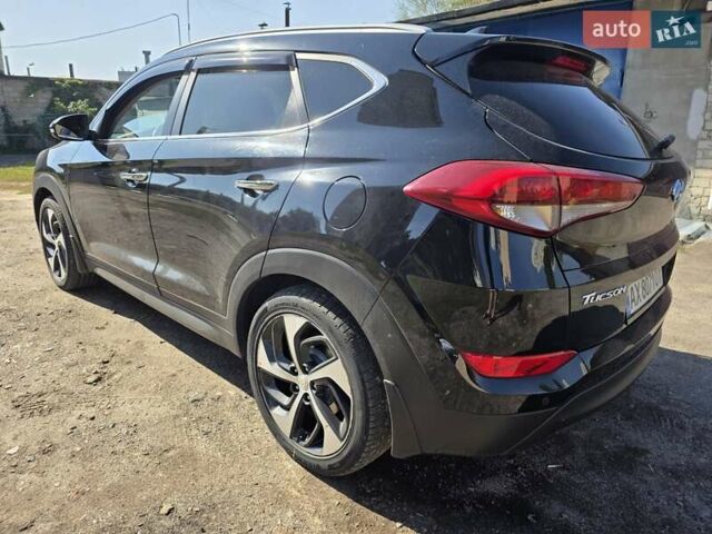 Черный Хендай Туксон, объемом двигателя 1.98 л и пробегом 112 тыс. км за 18300 $, фото 6 на Automoto.ua