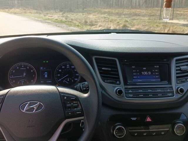 Чорний Хендай Туксон, об'ємом двигуна 1.6 л та пробігом 150 тис. км за 13500 $, фото 1 на Automoto.ua