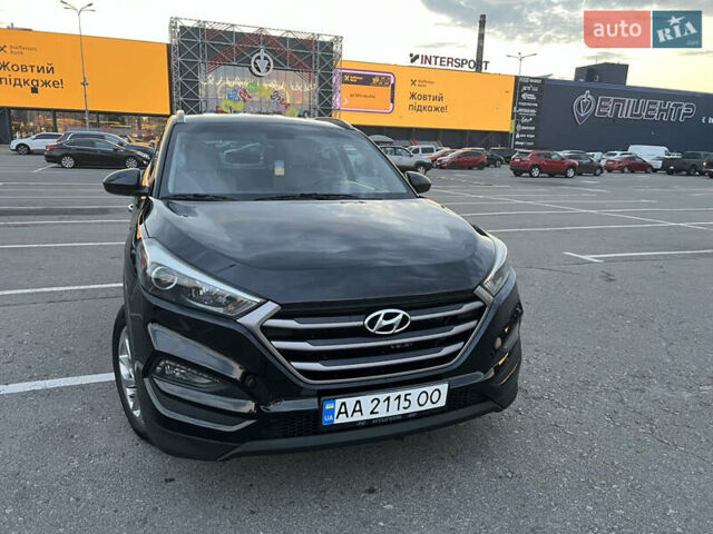 Черный Хендай Туксон, объемом двигателя 2 л и пробегом 159 тыс. км за 16500 $, фото 1 на Automoto.ua