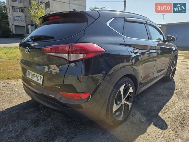 Чорний Хендай Туксон, об'ємом двигуна 1.98 л та пробігом 110 тис. км за 18700 $, фото 6 на Automoto.ua