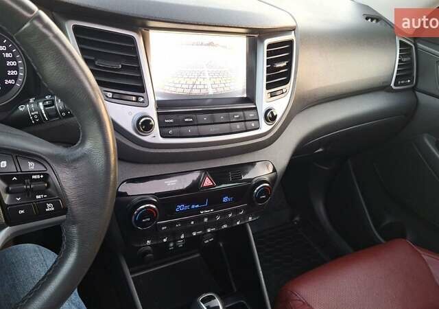 Чорний Хендай Туксон, об'ємом двигуна 2 л та пробігом 192 тис. км за 21000 $, фото 61 на Automoto.ua