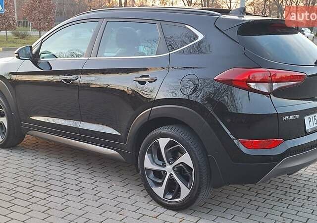 Черный Хендай Туксон, объемом двигателя 2 л и пробегом 192 тыс. км за 19999 $, фото 14 на Automoto.ua