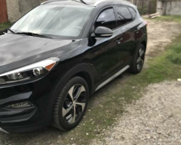 Черный Хендай Туксон, объемом двигателя 1.59 л и пробегом 188 тыс. км за 15500 $, фото 6 на Automoto.ua