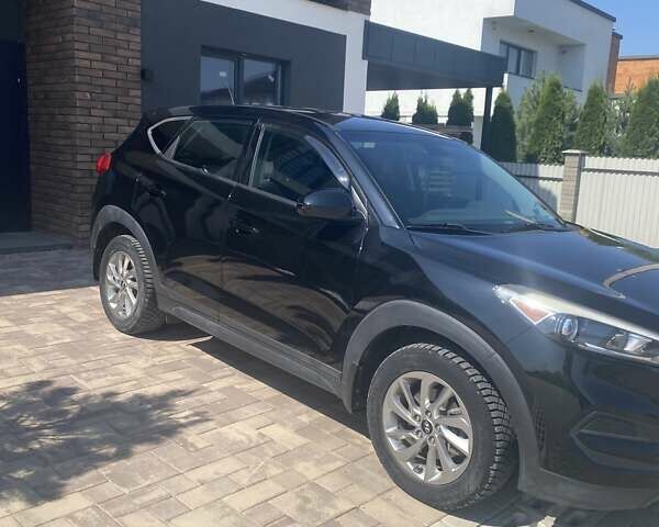 Черный Хендай Туксон, объемом двигателя 2 л и пробегом 126 тыс. км за 14500 $, фото 7 на Automoto.ua