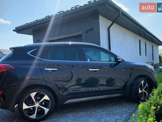 Черный Хендай Туксон, объемом двигателя 1.59 л и пробегом 92 тыс. км за 18800 $, фото 5 на Automoto.ua