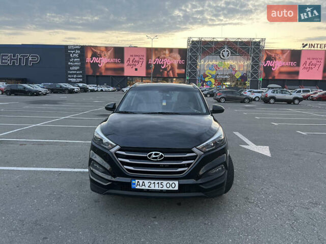 Черный Хендай Туксон, объемом двигателя 2 л и пробегом 159 тыс. км за 16500 $, фото 7 на Automoto.ua
