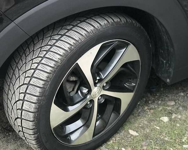 Черный Хендай Туксон, объемом двигателя 1.59 л и пробегом 188 тыс. км за 15500 $, фото 4 на Automoto.ua