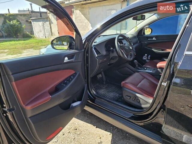 Черный Хендай Туксон, объемом двигателя 1.98 л и пробегом 112 тыс. км за 18300 $, фото 8 на Automoto.ua