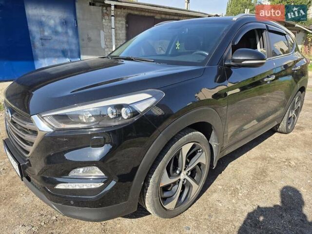 Чорний Хендай Туксон, об'ємом двигуна 1.98 л та пробігом 110 тис. км за 18700 $, фото 2 на Automoto.ua