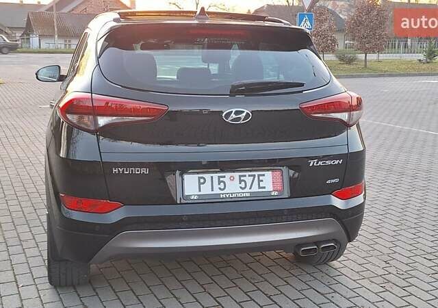 Черный Хендай Туксон, объемом двигателя 2 л и пробегом 192 тыс. км за 19999 $, фото 12 на Automoto.ua