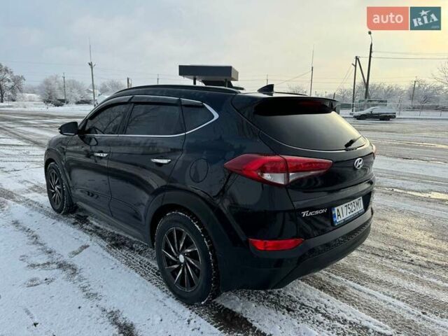 Черный Хендай Туксон, объемом двигателя 2 л и пробегом 103 тыс. км за 18500 $, фото 2 на Automoto.ua