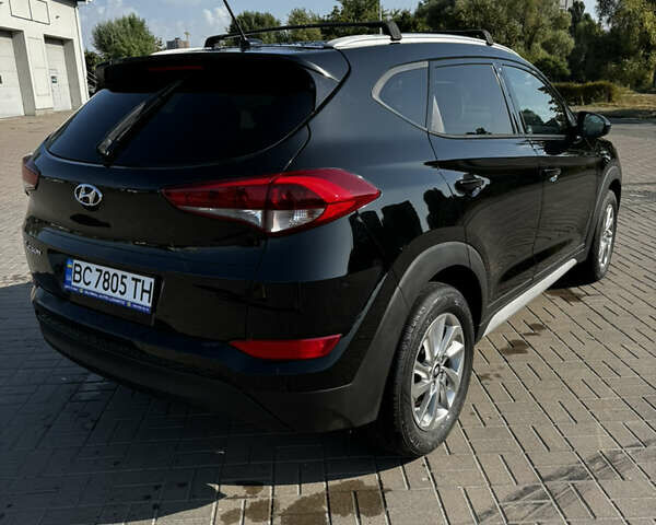 Черный Хендай Туксон, объемом двигателя 2 л и пробегом 110 тыс. км за 18000 $, фото 8 на Automoto.ua
