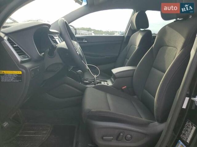 Чорний Хендай Туксон, об'ємом двигуна 2 л та пробігом 165 тис. км за 2900 $, фото 6 на Automoto.ua