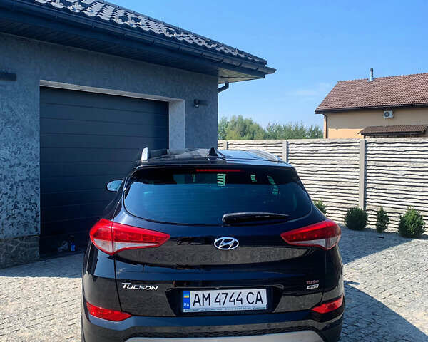 Черный Хендай Туксон, объемом двигателя 1.59 л и пробегом 92 тыс. км за 18800 $, фото 3 на Automoto.ua