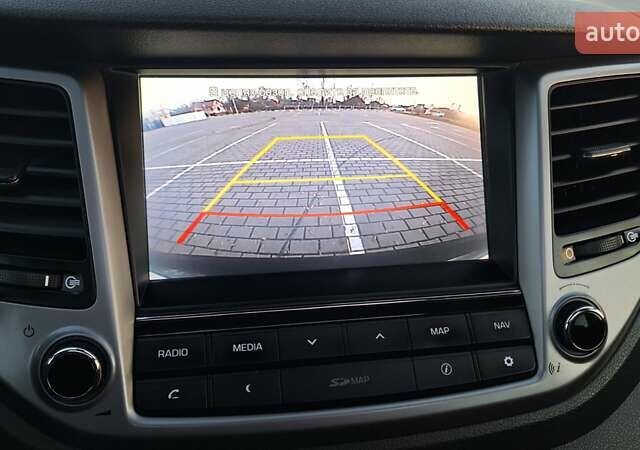 Чорний Хендай Туксон, об'ємом двигуна 2 л та пробігом 192 тис. км за 21000 $, фото 58 на Automoto.ua