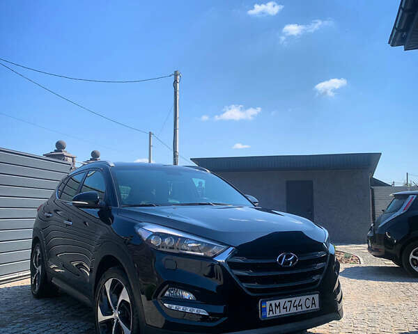 Черный Хендай Туксон, объемом двигателя 1.59 л и пробегом 92 тыс. км за 18800 $, фото 1 на Automoto.ua