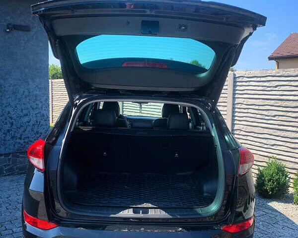 Черный Хендай Туксон, объемом двигателя 1.59 л и пробегом 92 тыс. км за 18800 $, фото 7 на Automoto.ua