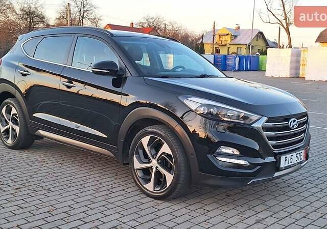 Чорний Хендай Туксон, об'ємом двигуна 2 л та пробігом 192 тис. км за 21000 $, фото 6 на Automoto.ua