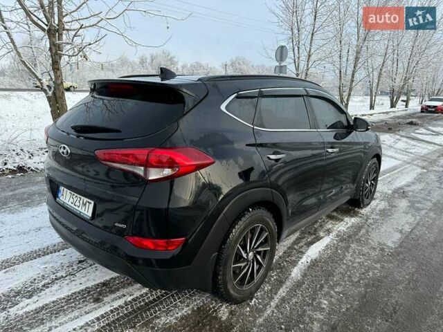 Черный Хендай Туксон, объемом двигателя 2 л и пробегом 103 тыс. км за 18500 $, фото 4 на Automoto.ua