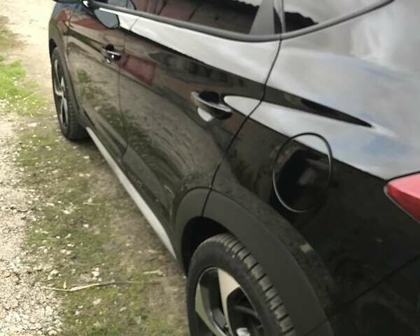 Черный Хендай Туксон, объемом двигателя 1.59 л и пробегом 188 тыс. км за 15500 $, фото 5 на Automoto.ua