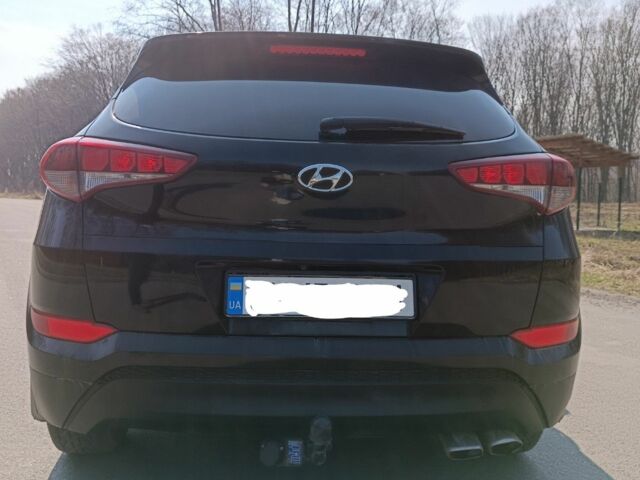 Чорний Хендай Туксон, об'ємом двигуна 1.6 л та пробігом 150 тис. км за 13500 $, фото 4 на Automoto.ua