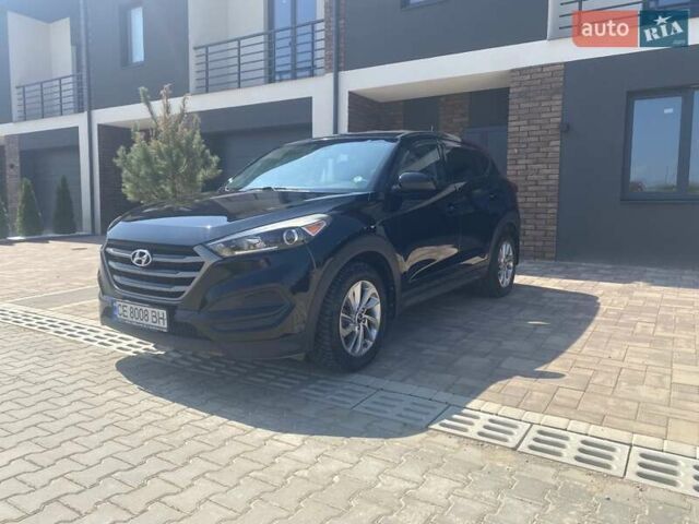 Черный Хендай Туксон, объемом двигателя 2 л и пробегом 126 тыс. км за 14500 $, фото 2 на Automoto.ua