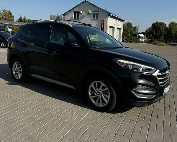 Черный Хендай Туксон, объемом двигателя 2 л и пробегом 110 тыс. км за 18000 $, фото 2 на Automoto.ua