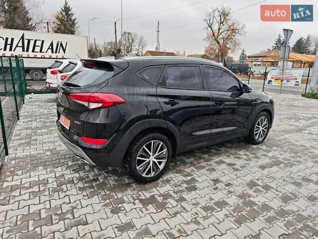 Черный Хендай Туксон, объемом двигателя 2 л и пробегом 178 тыс. км за 19200 $, фото 6 на Automoto.ua