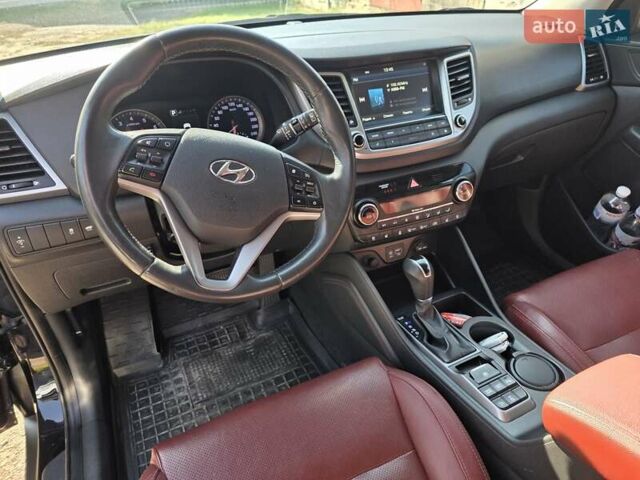 Черный Хендай Туксон, объемом двигателя 1.98 л и пробегом 112 тыс. км за 18300 $, фото 9 на Automoto.ua