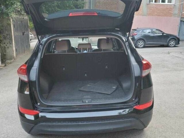 Чорний Хендай Туксон, об'ємом двигуна 2 л та пробігом 104 тис. км за 10100 $, фото 10 на Automoto.ua