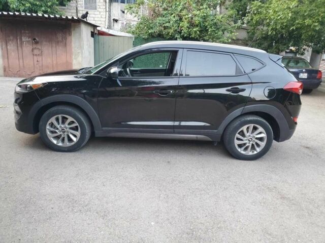 Чорний Хендай Туксон, об'ємом двигуна 2 л та пробігом 104 тис. км за 10100 $, фото 9 на Automoto.ua