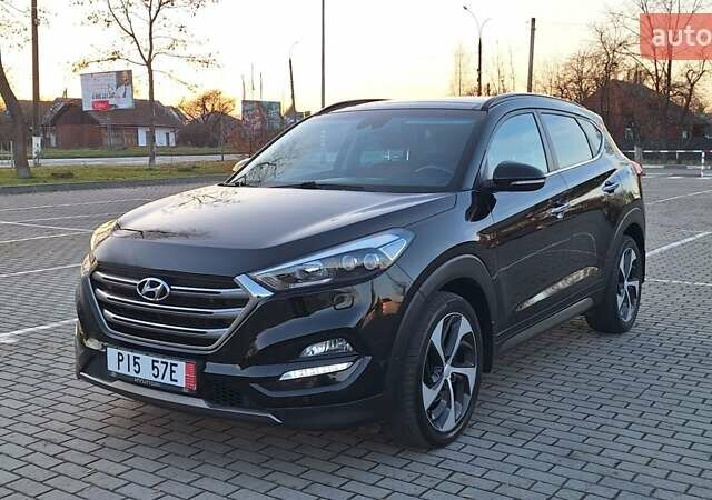 Чорний Хендай Туксон, об'ємом двигуна 2 л та пробігом 192 тис. км за 21000 $, фото 3 на Automoto.ua