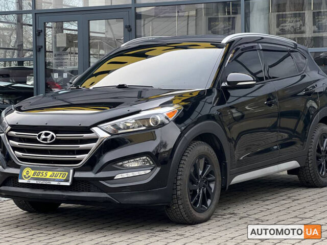 Черный Хендай Туксон, объемом двигателя 2 л и пробегом 106 тыс. км за 17900 $, фото 2 на Automoto.ua