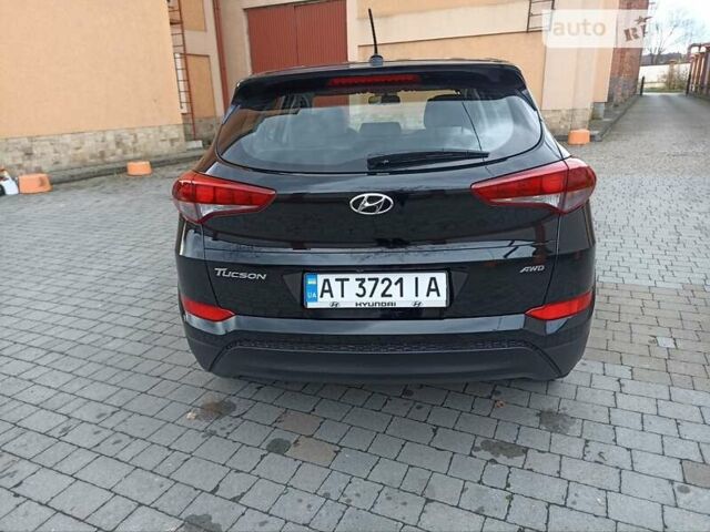 Черный Хендай Туксон, объемом двигателя 2 л и пробегом 107 тыс. км за 14800 $, фото 6 на Automoto.ua