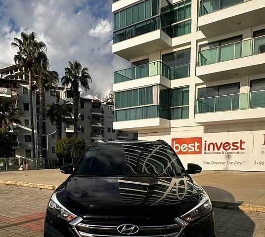 Черный Хендай Туксон, объемом двигателя 2 л и пробегом 120 тыс. км за 21000 $, фото 6 на Automoto.ua