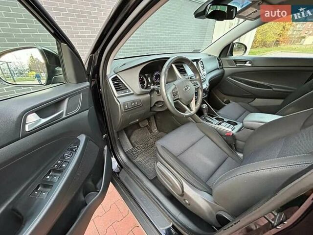 Чорний Хендай Туксон, об'ємом двигуна 1.69 л та пробігом 98 тис. км за 14000 $, фото 12 на Automoto.ua