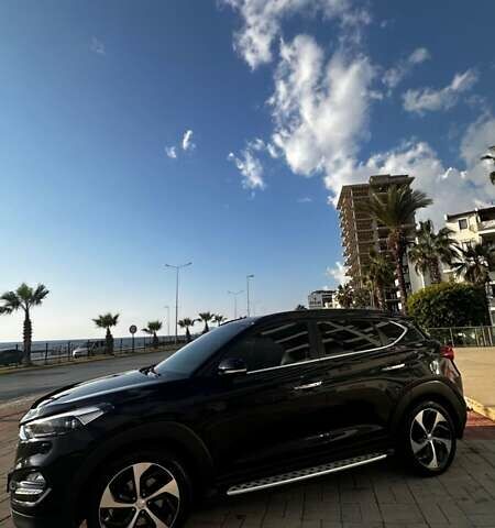 Черный Хендай Туксон, объемом двигателя 2 л и пробегом 120 тыс. км за 21000 $, фото 1 на Automoto.ua