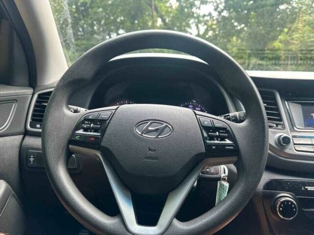 Черный Хендай Туксон, объемом двигателя 2 л и пробегом 83 тыс. км за 4400 $, фото 9 на Automoto.ua