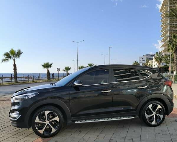 Черный Хендай Туксон, объемом двигателя 2 л и пробегом 120 тыс. км за 21000 $, фото 13 на Automoto.ua