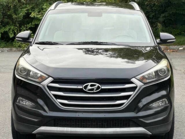 Черный Хендай Туксон, объемом двигателя 1.6 л и пробегом 53 тыс. км за 2950 $, фото 1 на Automoto.ua