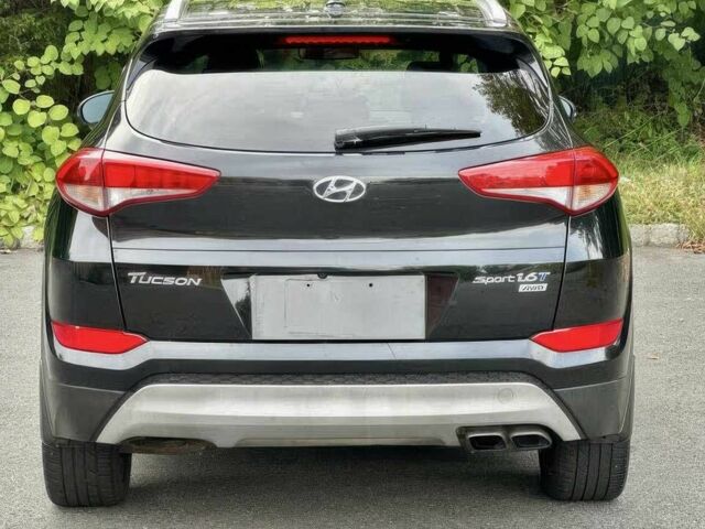 Черный Хендай Туксон, объемом двигателя 1.6 л и пробегом 53 тыс. км за 2950 $, фото 4 на Automoto.ua