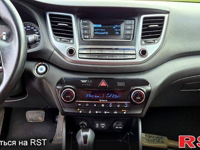 Черный Хендай Туксон, объемом двигателя 2 л и пробегом 123 тыс. км за 15900 $, фото 10 на Automoto.ua