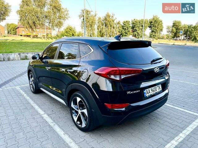 Черный Хендай Туксон, объемом двигателя 2 л и пробегом 98 тыс. км за 24000 $, фото 7 на Automoto.ua