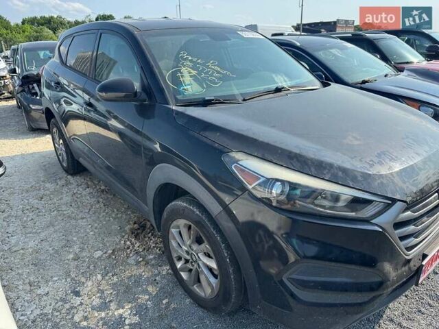 Чорний Хендай Туксон, об'ємом двигуна 2 л та пробігом 119 тис. км за 11700 $, фото 2 на Automoto.ua