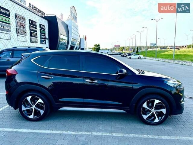 Черный Хендай Туксон, объемом двигателя 2 л и пробегом 98 тыс. км за 24000 $, фото 10 на Automoto.ua