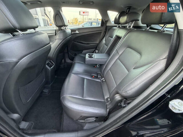 Черный Хендай Туксон, объемом двигателя 1.59 л и пробегом 182 тыс. км за 16800 $, фото 23 на Automoto.ua