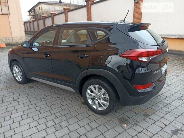 Черный Хендай Туксон, объемом двигателя 2 л и пробегом 107 тыс. км за 14800 $, фото 8 на Automoto.ua