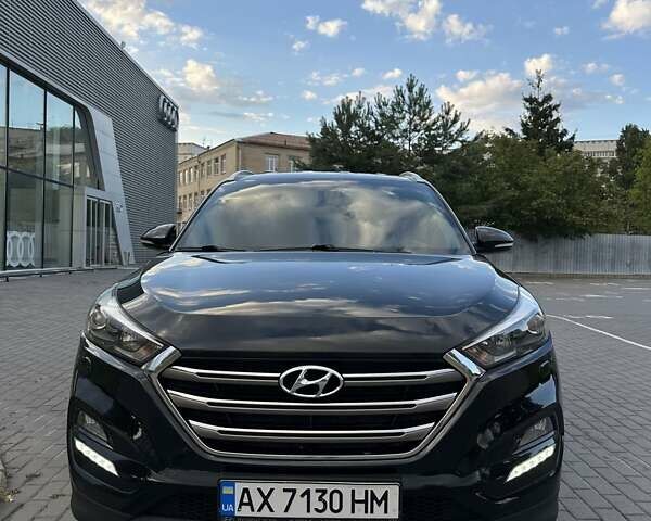Черный Хендай Туксон, объемом двигателя 2 л и пробегом 147 тыс. км за 20500 $, фото 2 на Automoto.ua