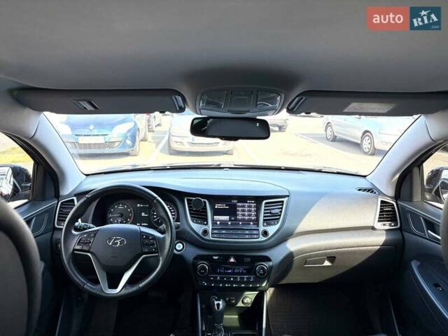 Черный Хендай Туксон, объемом двигателя 2 л и пробегом 98 тыс. км за 24000 $, фото 17 на Automoto.ua